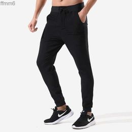 Mens Jogging Sports Casual Pants Running Fitness Gym Clothes Men Tights Loose Multi Pocket Zipper Elastic Workout Trouses