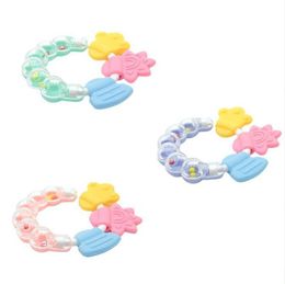 Baby rattle tooth glue hand rattle baby soothing silicone bite ring combination teeth grinder wholesale