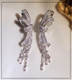Luxury Shining Crystal Sweet Bowknot Designer Stud Earrings Long Tassel Dangle Pendant CZ Diamond Earring Ear Rings Party Wedding 6354772
