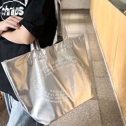 Silver tote with high-end feel, large capacity hand-held shoulder bag, autumn 2024 niche design, versatile women's bag