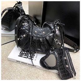 Crocodile pattern underarm 2023 wrinkled crescent single shoulder for women rivet locomotive bag 55% Off Factory Online