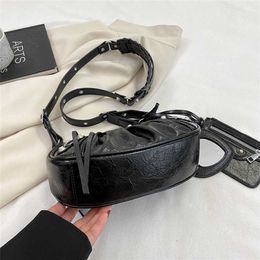 2023 New Locomotive Underarm Rivet Tassel Three in One Teeth Fold Single Shoulder Crossbody Women's Bag 55% Off Factory Online