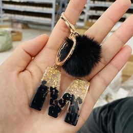 Keychains Lanyards 26 Initial Black Stone Filled Keychain With Fluffy Ball Pendant for Women Resin Keyring Car Key Holder Handbag Accessories 230831