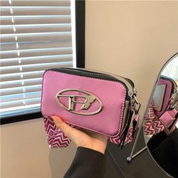 This year's popular camera 2023 summer new women's personality letter single wide shoulder strap crossbody bag 55% Off Factory Online