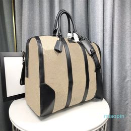 2023-Top Quality handbag Large Capacity Duffle Bag lock Travel Bags Outdoor Soft Genuine Leather canvas Print Letter Designer Luggage