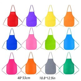 Aprons 12Pcs Kids Colourful Children Single Use Outdoor NonWoven Fabric Art Apron Cooking Bib Work Kindergarten Home 230901