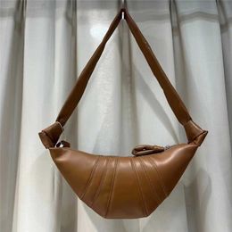 Cowhide Bag for Women 2023 New French Fashion Song Ox Horn Bag for Small People Texture Dumpling Bag Cross Body Waist Bag 230902