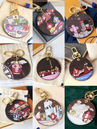 Designer Brand Womens Key Wallets Sunflower Flower Letter Ladies Round Keyring Bags Totes Pendant Mens Car Keychain Female Bags Pendants Accessories Dog Cat Charms