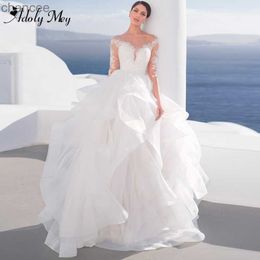 Basic Casual Dresses Adoly Mey Luxury Scoop Neck Beading Illusion Back A-Line Wedding Dress 2023 Ruched Tulle Long Sleeve Appliques Boho Wedding Gown LST230904