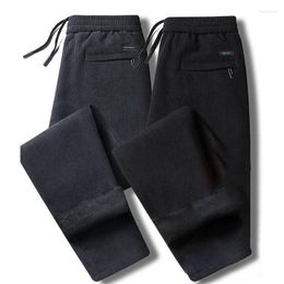 Pantaloni da uomo in velluto a coste da uomo Casual pantaloni caldi a righe larghe dritte 2023 autunno primavera peluche elastico maschile