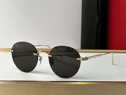 New fashion design round sunglasses 0393S rimless K gold frame simple and popular style versatile outdoor uv400 protection eyewear