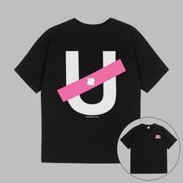 Pink Slash Letter U Print Designer Mens T shirts UNDEFEATED UNDFTD Japan Graphic Tee Men Women Unisex T shirt 100% Cotton Casual Oversize TShirts S-2XL