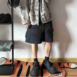 Men's Tracksuits designer 2023 Summer Online Red New Product Waste Soil Wind Destruction Water Wash Speckled Ink Workwear Loose Shorts and Capris G88O