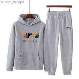 Men's Tracksuits Designer Tracksuits Winter Tracksuit Men Women TRAPSTAR Printed Sportswear Luxury basketball Loose Hooded Sweater Pants Couple Sets T230905