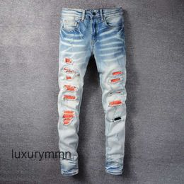 Jeans Amirrs T Shirts Designer 2023 Jean Casual Hip Hop Worn Out and Washed Splash Ink Colour Painting Slim Fit Men's IC2D