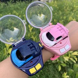 ElectricRC Car 2.4G Children's Mini Watch Remote Control Car Toy Novelty RC Car Toy Cartoon Portable USB Charging Watch Car Kid Birthday Gift 230906