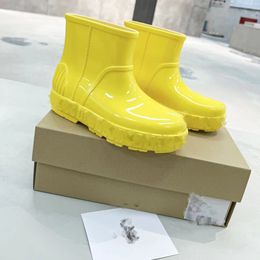 High version new Australia designer ugglies short tube fur boots winter summer rainy season 2023 anti slip Waterproof rain shoes women's water bottes UGGLI