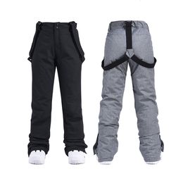 Spodnie narciarskie mężczyźni kobiety narciarskie spodnie wiatroodporne wodoodporne zimowe spodnie śnieżne sporty na snowboardzie oddychające do oddychania Paski Unisex 230906