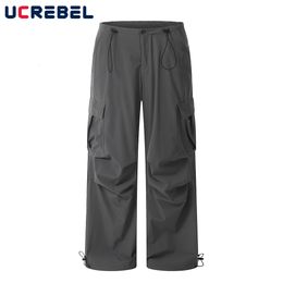 Mens Pants Solid Colour Drawstring Casual Trousers Mens Safari Style Pleated Loose Straightleg Pants Simple Pocket Jogger Pants 230906