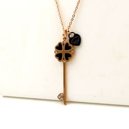 2024 Long Rose Gold Coat Chain Fashion English Black Peach Heart Four Leaf Grass Key Sweater Necklace Female