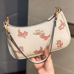 Women's Designer Bags Tote 2023 Aolai's New Cute Cat Print Teri Armpit Mahjong Lychee Grain Cowhide Hand Factory Direct Sales