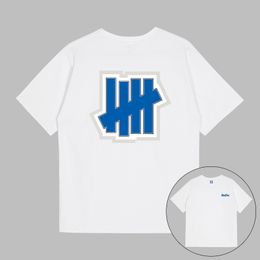 23 Ins Brand Mens Designer T shirts UNDEFEATED Stroke Blue ICON Graphic Tee UNDFTD Japan Printed men T shirt 100% Cotton Casual Short Sleeve Oversize TShirts S-2XL
