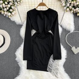 Casual Dresses Fashion Design Long Sleeve Round Neck Open Back Tassels Dress Women Waist Slim Fit A-line Buttocks Wrapped Short