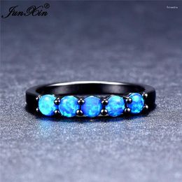 Wedding Rings JUNXIN Boho Female Small Stone Ring Blue Fire Opal For Women Black Gold Filled Bands Unique Birthstone