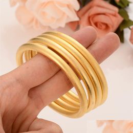 Bangle 24K 65Mm Gold Dubai Bracelet Africa Arab Items 4 Pieces Assemble Wholesale Fashion Abrasive Blasting Jewelry Drop Delivery Brac Dh8Fb