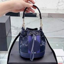 Стильная дизайнерская сумка на плечо сумку роскошная сумочка мини -ковша сумки женская новая модная классическая сумочка сумочка поперечная сумка