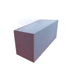 Steam pressurized concrete block construction with lightweight solid brick blocks