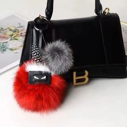 2023 luxury logo Fluffy Karl Genuine Raccoon Fur Pompom Monster Bag Bugs Charm Keychain Plush Key Ring Leather Tassel Pompom very good