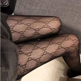 Autumn and winter tight one-piece silk stockings pattern Elastic Black Fishnet tight silk stockings with hollow sexy247D