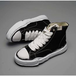 MMY Shoes Best-quality matching black and white elevated low top mens and womens thick soled deformation dissolving canvas designer
