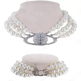 Luxury Fashionable Pearl necklace Advanced retro Three layer pearl Shiny Saturn bead pendant304K