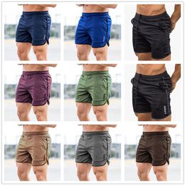2021 Men Running Shorts Sports Gym Compression Phone Pocket Wear Under Base Layer Short Pants Athletic Solid Tights188m