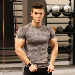 Brand Short Men's Quick Drying Clothes Sports mens gym clothes Tight Basketball Training Fitness Wear T-Shirt Whole200V