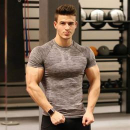 Brand Short Men's Quick Drying Clothes Sports mens gym clothes Tight Basketball Training Fitness Wear T-Shirt Whole202f