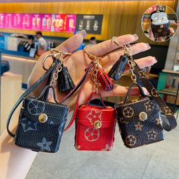 Fashion Designer Airpods Case Keychains Trinkets PU Leather Key Rings Chains Jewellery Brown Flower Pendant Bag Charms Keyrings Car 295M