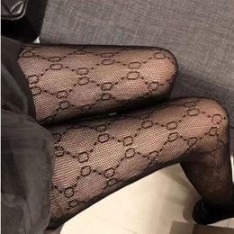 Autumn and winter tight one-piece silk stockings pattern Elastic Black Fishnet tight silk stockings with hollow sexy245c