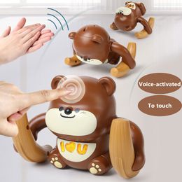 Intelligence toys Voiceactivated Induction Cartoon Scrolling Toy Baby Light Music Flipping Monkey Piggy Children Interactive Gift 230911