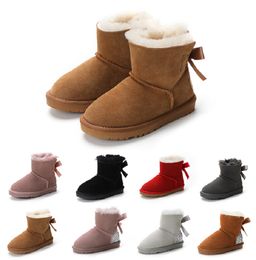 Stivali per bambini scarponi da neve Designer Scarpe per bambini invernali Sneakers classiche Mini Boot Botton neonati maschi ragazze Stivaletti alla caviglia pelliccia di capretto Pelle scamosciata 22-35