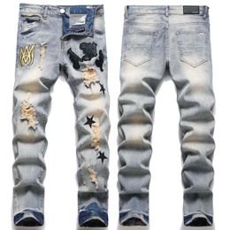 Ou Chao Men's Broken Hole AM Letter Star Embroidery Slim Fit Denim Pants Personalized Badge Street Blue Spring Small Feet Pants Old