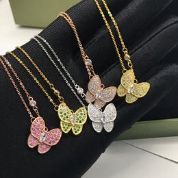 Titanstahl-Halskette mit glänzendem Schmetterlingsanhänger für Damen, hohe Qualität, lichtbeständig, für den Großhandel, weiß, rosa, grün, Partygeschenk, goldene Beschichtung