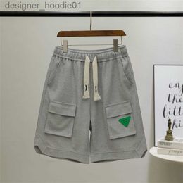 Womens Shorts Mens Shorts Personality Shorts High Street Cargo Big Pocket Half Pants Green Leather Label Drawstring Casual Shorts Mens Youth Pants Capris 230426 L23