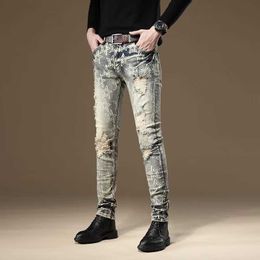 Jeans alla moda a vita media, tendenza pigra, tendenza giovanile, lavati, stile primaverile, vestibilità slim, pantaloni lunghi da uomo