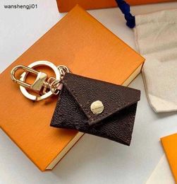 23ss Designer Letter Wallet Keychain Fashion Purse Pendant Car Keyring Brown Flower Mini Bag Trinket Gifts Accessories Including box