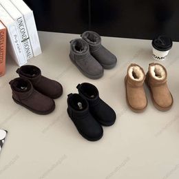 2024 Australien Kinderschuhe Mädchen Ugglies Stiefel Winter Warme echtes Leder Knöchel Kleinkind Jungen Bottes UGGLI Schuh Kinder Schneestiefel Baby Plüsch Mini Knopf Schleife Booties