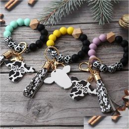 Other Festive Party Supplies Sile Cursive Cow Bead Bracelet Wood Disk Keychain Tassel Ox Head Wrist Key Ring Charm Pendant Accessory F Dhgb2