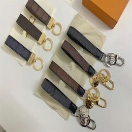 High Quality 2021 With box Luxury Accessories Key Buckle lovers Car Keychain Handmade Designer Leather Keychains Men Women Bags Pe313a